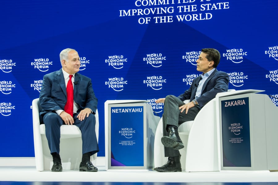 Premier Izraela Benjamin Netanyahu (z lewej) podczas Światowego Forum Ekonomicznego w Davos.